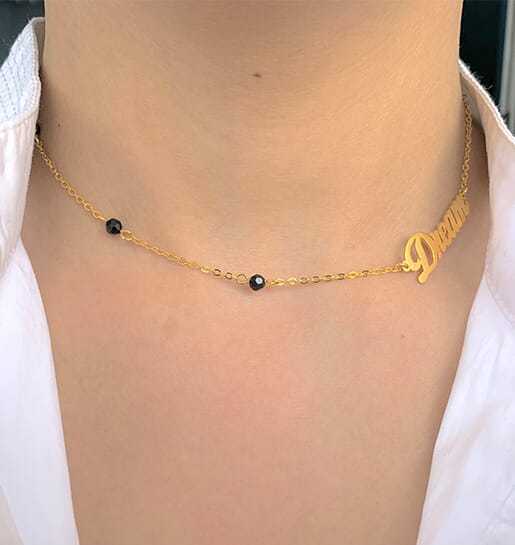 NECKLACE WITH ONYX STONES AND WORD "DREAM"